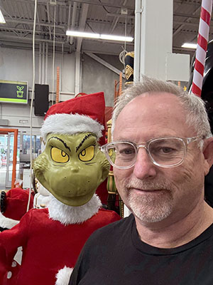 Picture of John Poirier with the Grinch